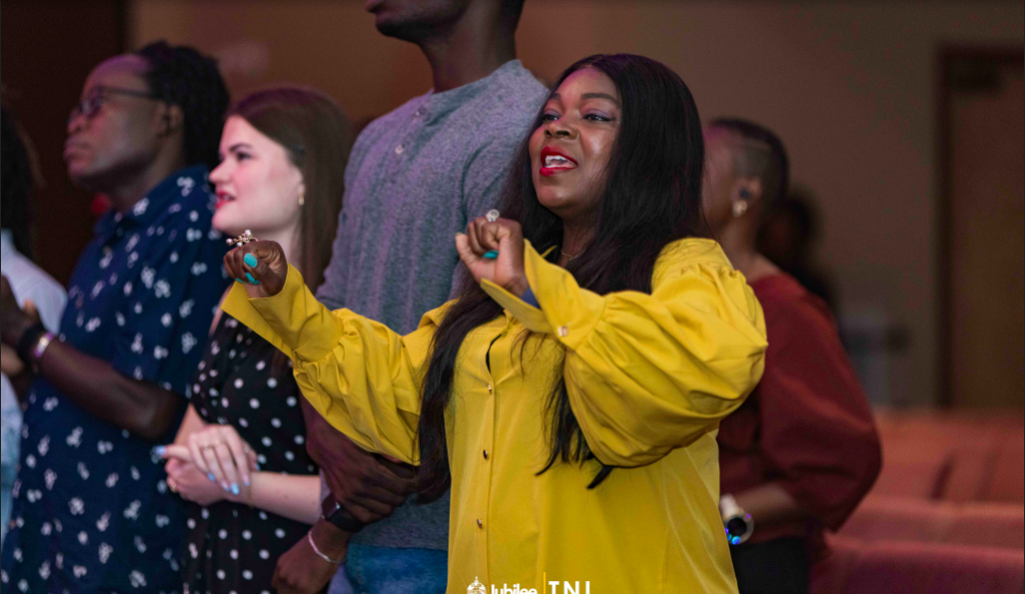 Members of the congregation singing together