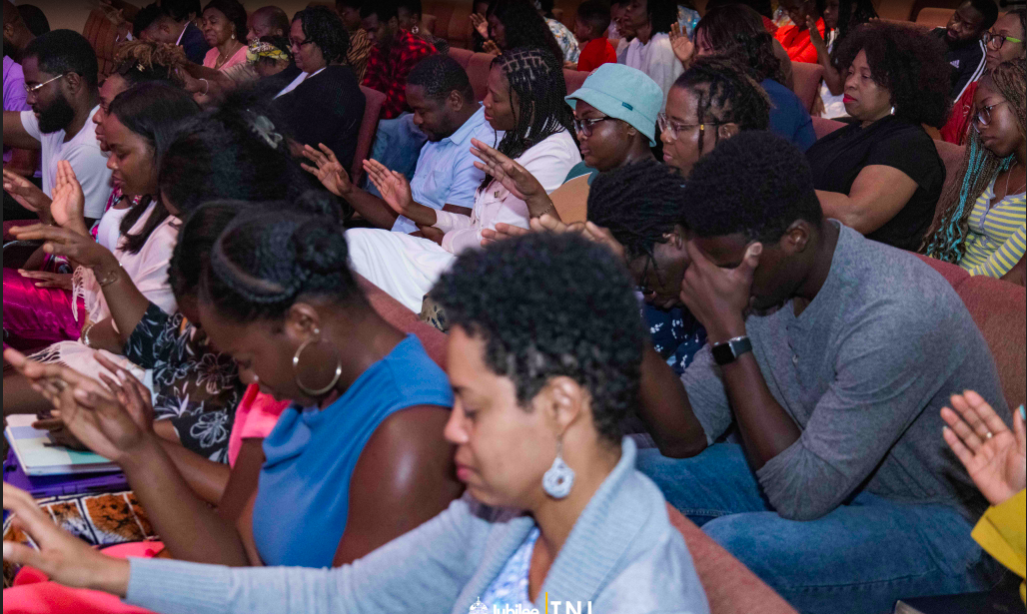 Jubilee’s congregation praying together