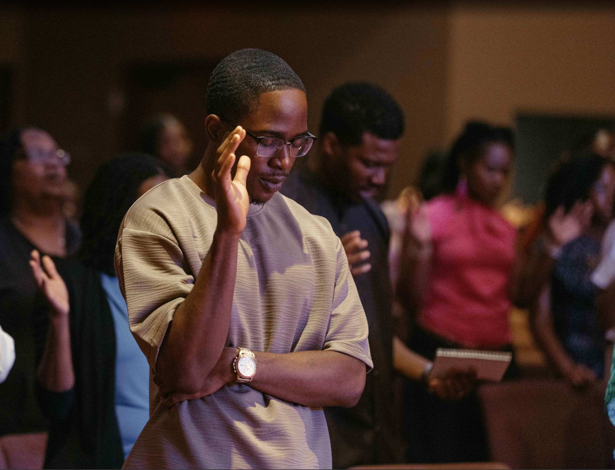 A member of the congregation praying